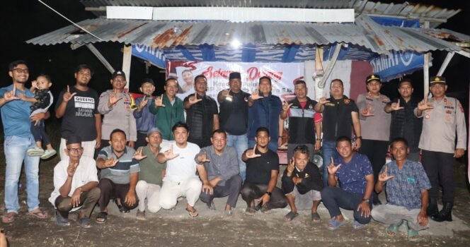 
 KAPOLRES PELALAWAN SAMBANGI POSKAMLING DI RT 008 RW 011: PERKUAT SINERGI DENGAN MASYARAKAT