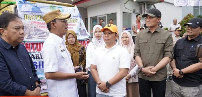 
 Bupati padanglawas serahkan langsung bantuan kemanusiaan bencana kepada bupati Tapanuli Selatan