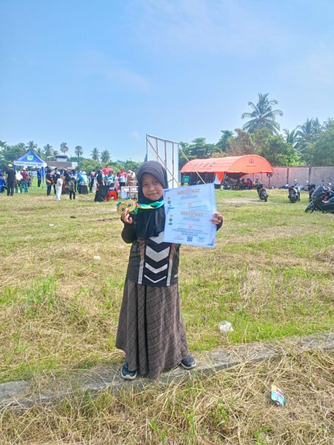 
 Fatimah, Putri Bungsu Tri Romawi Sabet 2 Medali Emas Panahan Riau